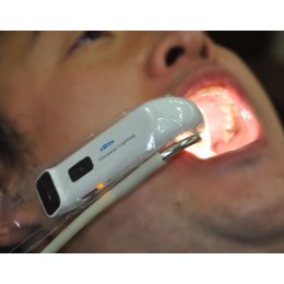 eBite (Electronic Bite) - беспроводная система интраоральной подсветки и аспирации